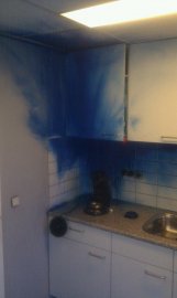 Photo of the result of a blue spray can that had exploded